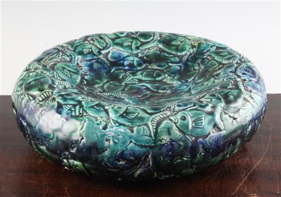 Kate Malone. A green and blue glazed fish moulded bowl, diameter 32.5cm